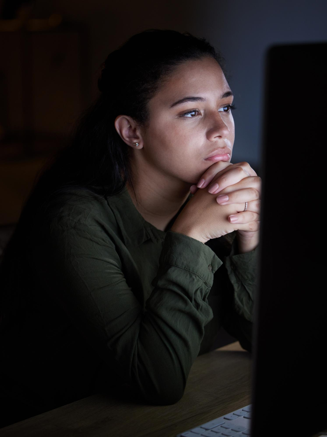Woman focused on computer screen