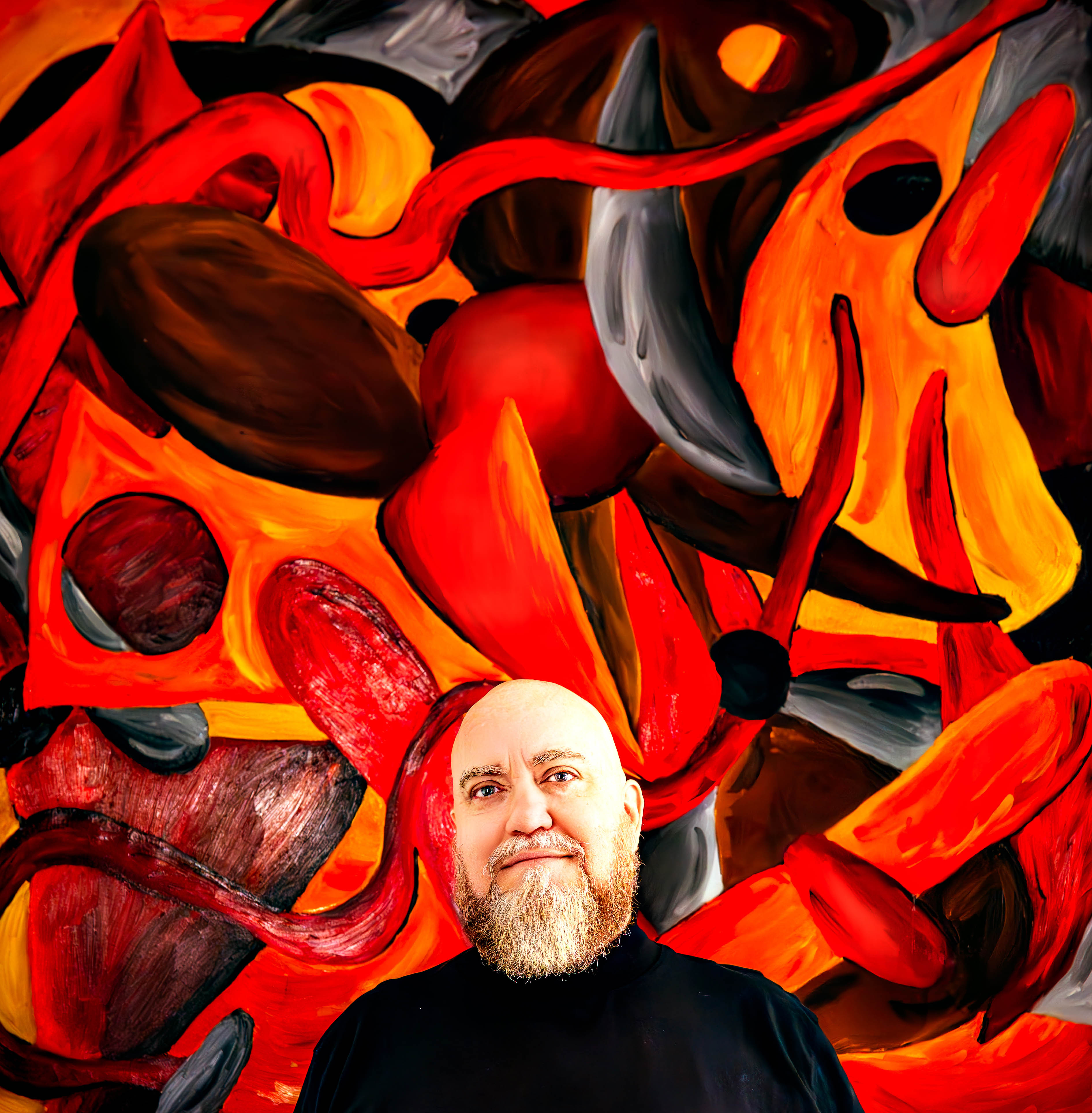 Man in front of abstract painting.